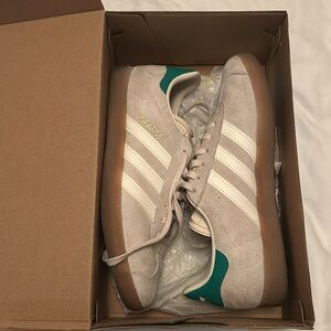 Beige and green adidas Gazelle sneakers